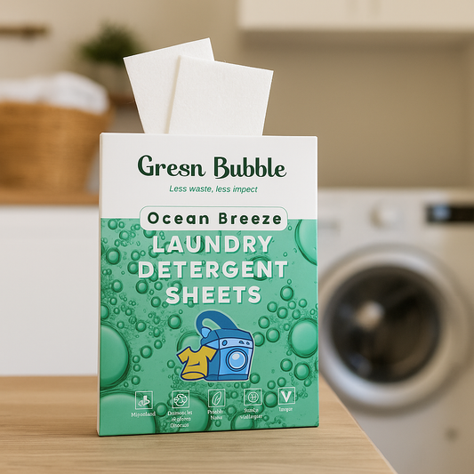 Green Bubble eoc-friendly laundry detergent sheets packaging with a washing machine in the background