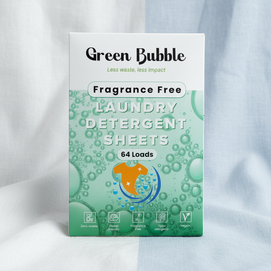 Box of Green Bubble fragrance-free laundry detergent sheets on a light fabric background